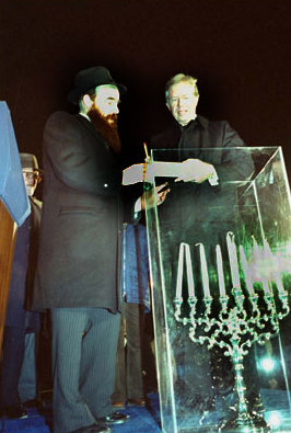 Jimmy Carter, the 39th President of the United States, lighting the National Menorah for the first time in 1979.