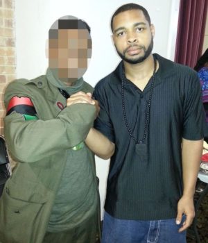 Killer Micah Johnson poses with man wearing Black militant garb with Africa patch. Will the tricolor Africa flag and related symbols now be attacked and banned as was the Confederate flag?
