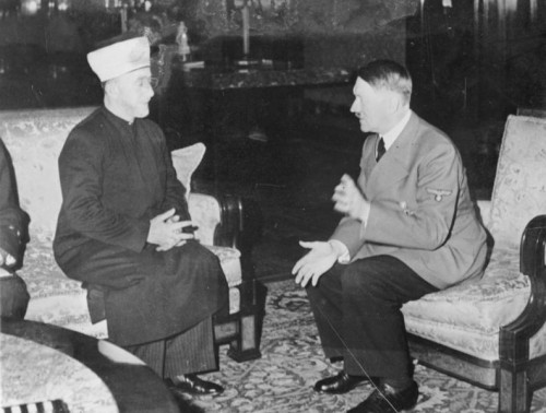 The Grand Mufti of Jerusalem, Amin al-Husayni (1893-1974), who was both the spiritual and political leader of Palestine's Moslems from 1921 until the mid-1940's, had red-blond hair and blue eyes. A strong opponent of the Zionists, he is shown below conferring with Adolf Hitler in Berlin in 1941.