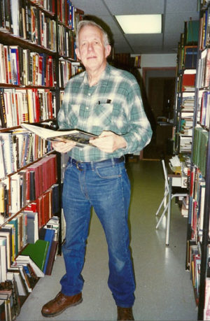 Dr William L. Pierce with part of his invaluable library, now saved for the movement by the takeover of the National Alliance and its transition under new chairman Will Williams.