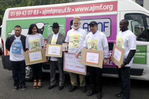 Rabbi Michel Serfaty, third from right, and employees of his French Jewish Muslim Friendship Association. He says he has only grown more determined to do his bridge-building work since the terror attacks in Paris in January.