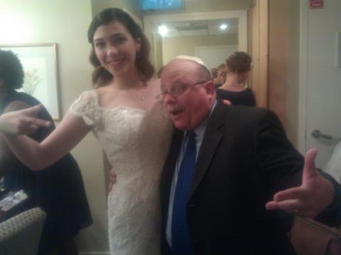 Rabbi Lebow in one of his typical "touchy-feely" pictures taken with a Jewish bride whose wedding he officiated.