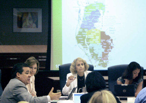 School district leaders meet in July 2007 to discuss switching to a system of neighborhood schools.
