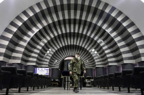 Asher Cherkasskiy walking in a Jewish center in Dnipropetrovsk, Ukraine -- quite an impressive structure for a tiny minority in an impoverished, war-torn nation.