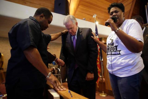 Missouri Governor Jay Nixon (D.) “prays” with Negroes during the violence, vows racial purge (“operational shifts”) in the Ferguson Police Department.