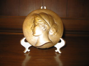 A bronze medallion by Federici; his wife was the model