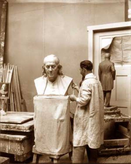 Federici working on a bust of Benjamin Franklin