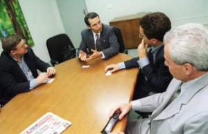 Israel's ambassador to Brazil, Eitan Surkis, meets with reporters.