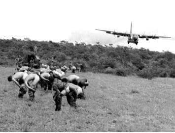 Rhodesia Security Forces give “brown-eyed salute” to incoming RAF Hercules flight carrying British traitors
