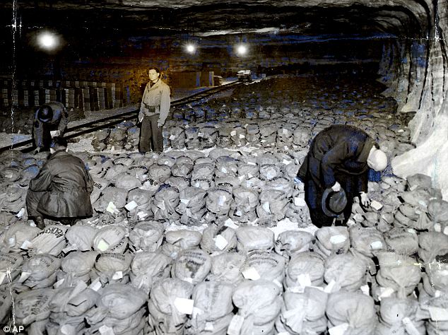 Liberated from the clutches of the high interest Western banking elites Hitler’s Third Reich soon became wealthier than the United States of America. When discovered by the invaders the Reich’s gold and silver reserves were shipped to American banks. Here we see troops from General Patton's Third Army stand among gold reserves hidden in a salt mine.